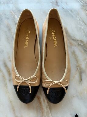 CHANEL Beige and Black Leather Cap-Toe Ballet Flats